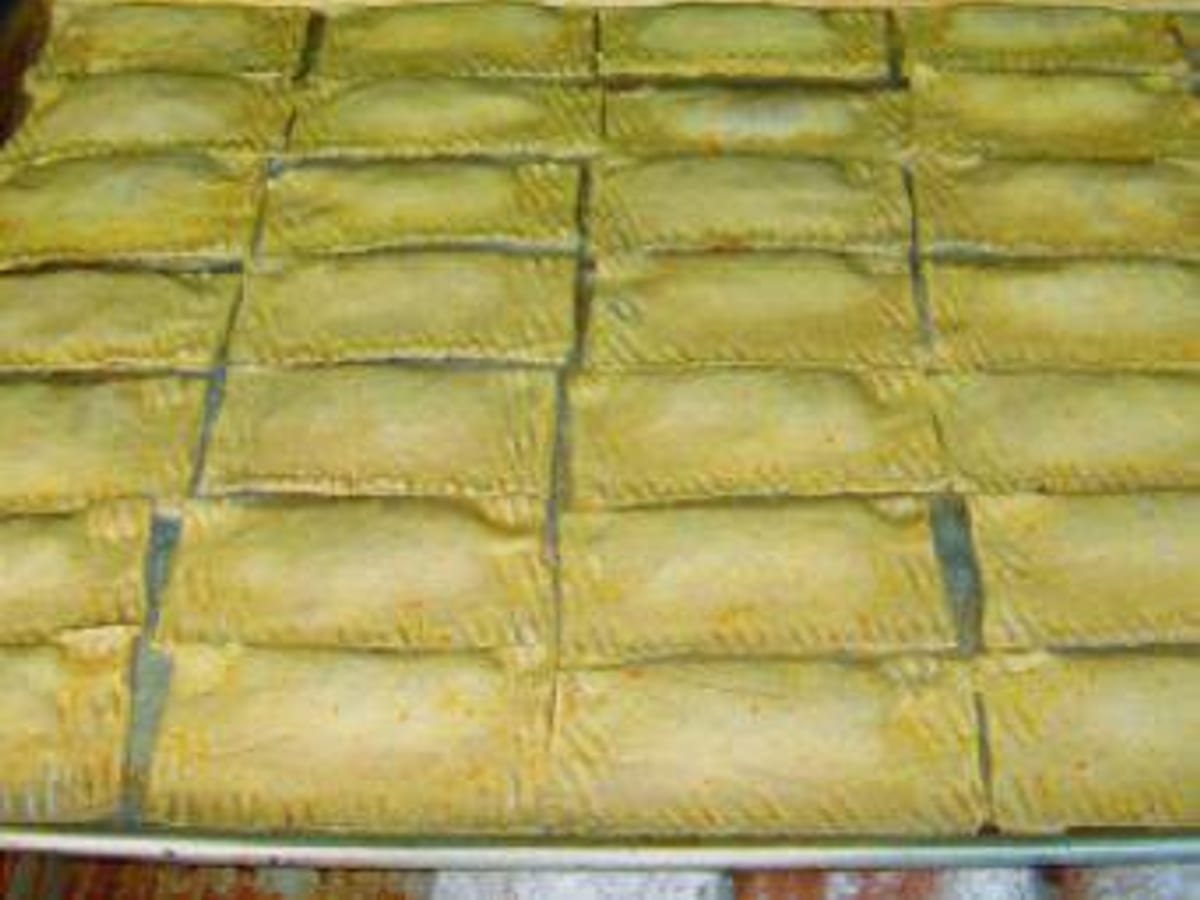 Paté cocó horneado, pastelitos cuadrados rellenos de coco